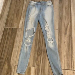 Distressed FashionNova jeans